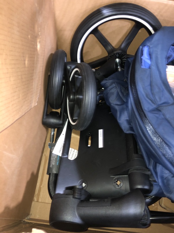 Photo 1 of Cybex e-Priam Complete Stroller, One-Hand Compact Fold, Reversible Seat, Smooth Ride All-Wheel Suspension, Extra Storage, Rocking Mode Technology w/App, Indigo Blue Seat with Chrome/Black Frame