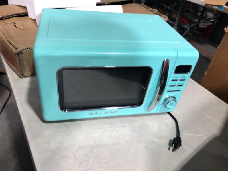 Photo 6 of ***USED - DIRTY - UNABLE TO TEST***
Galanz GLCMKZ09BER09 Retro Countertop Microwave Oven with Auto Cook & Reheat, 0.9 cu ft, Blue