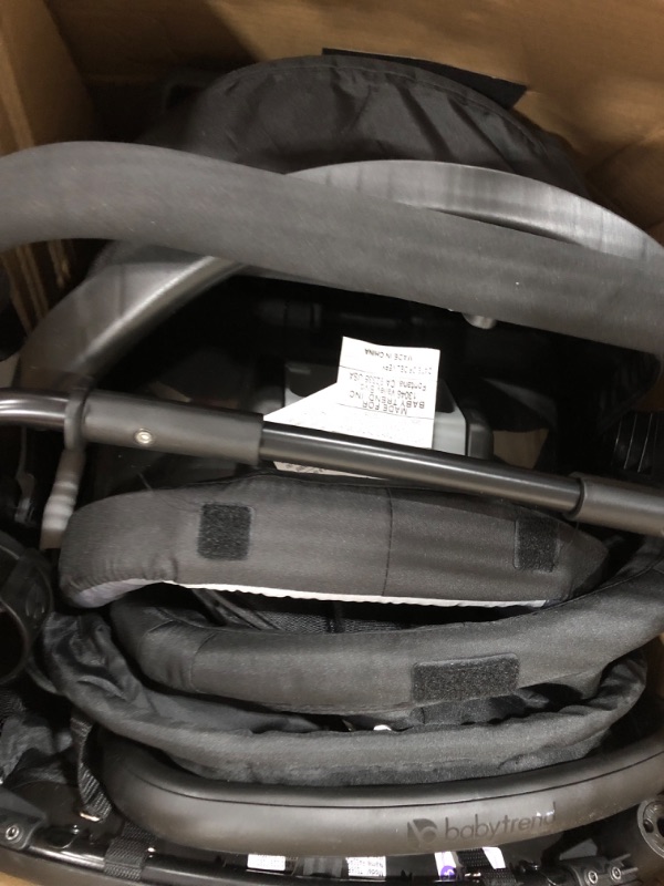 Photo 2 of ***USED - MISSING WHEELS - OTHER PARTS LIKELY MISSING AS WELL***
Baby Trend Passport Switch Modular Travel System with EZ-Lift Plus Infant Car Seat, Dash Black