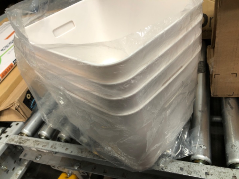 Photo 1 of 4 pack plastic bins 