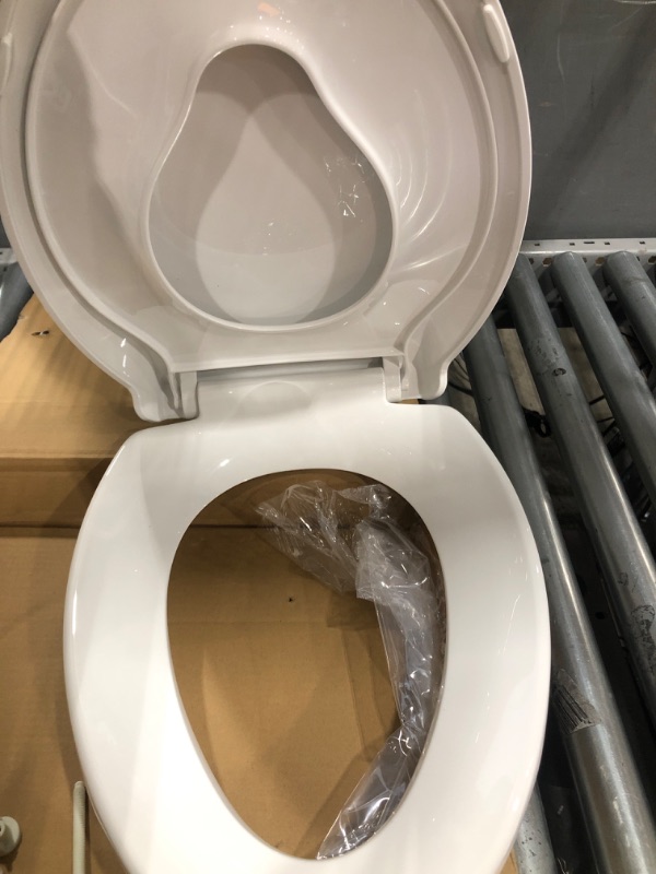 Photo 1 of Elongated Slow-Close Toilet Seat White with Quick Release Function, Simple Top Fixing Family Toilet Seat with Child Seat Built-in, Standard Toilet Seats with Adjustable Hinges