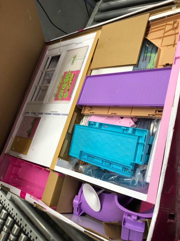 Photo 1 of Barbie Dreamhouse, Doll House Playset with 70+ Accessories Including Transforming Furniture, Elevator, Slide, Lights & Sounds Wheelchair Accessible Elevator