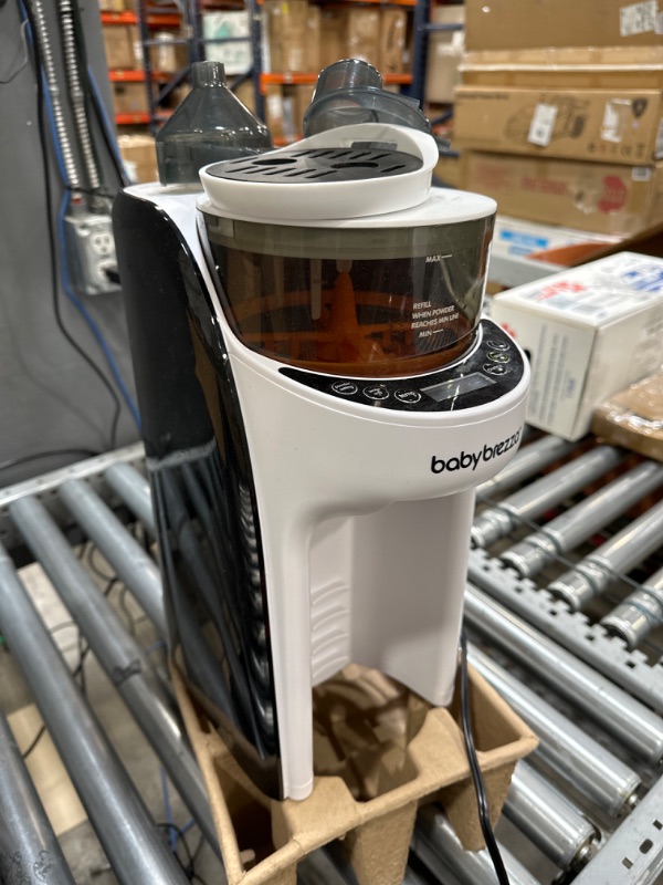 Photo 2 of Baby Brezza New and Improved Formula Pro Advanced Formula Dispenser Machine - Automatically Mix a Warm Formula Bottle Instantly - Easily Make Bottle with Automatic Powder Blending, White