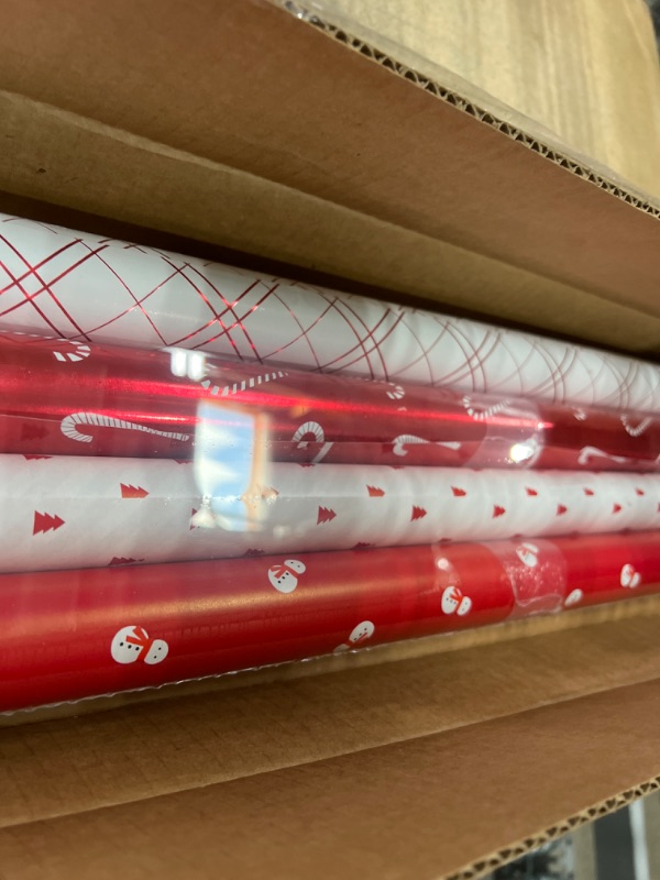 Photo 2 of American Greetings 120 sq. ft. Reversible White and Red Christmas Wrapping Paper Bundle for, Snowman, Tree, Candy Canes, Snowflakes (4 Rolls 30 in. x 12 ft.) Reversible Red and White