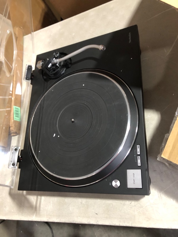 Photo 8 of ***USED - NO POWER CORD OR ACCESSORIES - UNABLE TO TEST***
Technics Turntable, Premium Class HiFi Record Player with Coreless Direct, Stable Playback, Audiophile-Grade Cartridge and Auto-Lift Tonearm, Dustcover Included – SL-100C, Black (SL-100C-K)