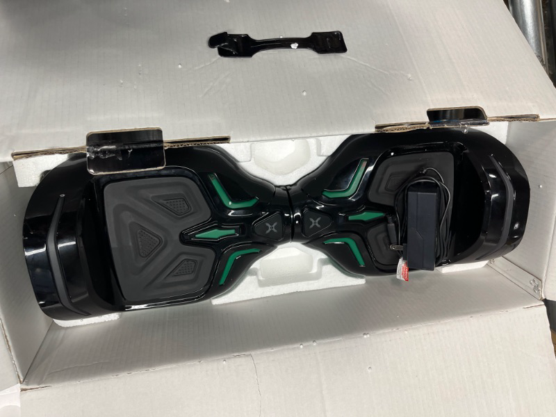 Photo 2 of Hover-1 Superfly Electric Hoverboard, 7MPH Top Speed, 6 Mile Range, Long Lasting Li-Ion Battery, 5HR Full Charge, Built-In Bluetooth Speaker, Rider Modes: Beginner to Expert, Black