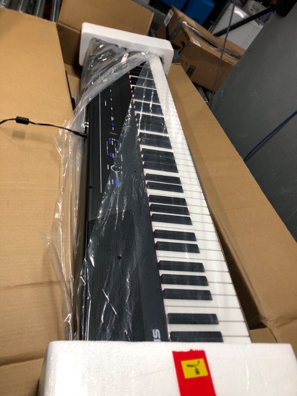 Photo 2 of Alesis Recital – 88 Key Digital Piano Keyboard with Semi Weighted Keys, 2x20W Speakers, 5 Voices, Split, Layer and Lesson Mode, FX and Piano Lessons Recital Piano Only