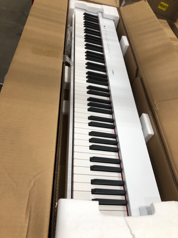 Photo 2 of Yamaha P225WH, 88-Key Weighted Action Digital Piano with Power Supply and Sustain Pedal, White (P225WH) White Digital Piano