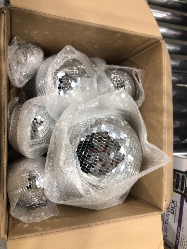 Photo 2 of Libima 12PCS Mirror Disco Balls Ornaments Silver Disco Ball Hanging Decoration Different Size 70s Disco Themed Party Decoration for Christmas Dance Music Stage Bar Party Supplies (12'', 8'', 6'', 4''). In good condition. 