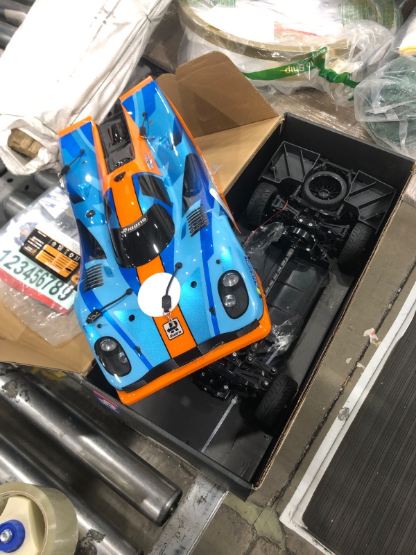 Photo 2 of AMORIL 1/10 Metal On-Road Drift Car Roller, RC Racing 4 Wheel Drive Supercar,Electric Touring Car Chassis Frame Body with 4 Wheels,All Aluminium Alloy Speed Bash Roller,Without Electric Parts,Cyan 1:10 Orange Metal Roller