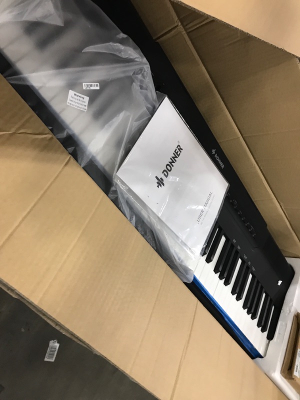 Photo 2 of Donner SE-1 88 Key Digital Piano, Full-Size Electric Piano Keyboard with Graded Hammer Action Weighted Keys, Including Sustain Pedal, Headphone, Power Adapter SE-1 Keyboard