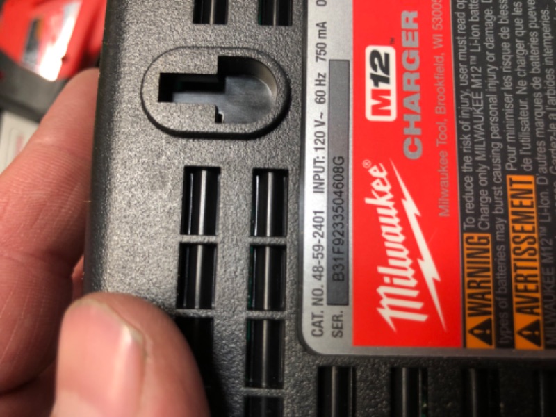 Photo 3 of ***USED - LIKELY MISSING PARTS - UNABLE TO VERIFY FUNCTIONALITY***
Milwaukee M12 12V Lithium-Ion Cordless 4-Tool Combo Kit with (2) Compact 1.5Ah Batteries and Charger