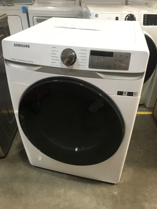 Photo 1 of DENTED LOWER BACK CORNER Samsung 7.5-cu ft Stackable Steam Cycle Smart Electric Dryer (White)
