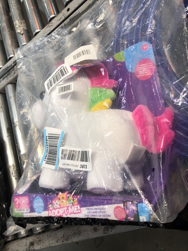 Photo 2 of Adopt Me! Neon Unicorn 12-Inch Light-Up Plush - Soft and Cuddly - Three Light-Up Modes - Directly from The #1 Game, Toys for Kids - Ages 6+