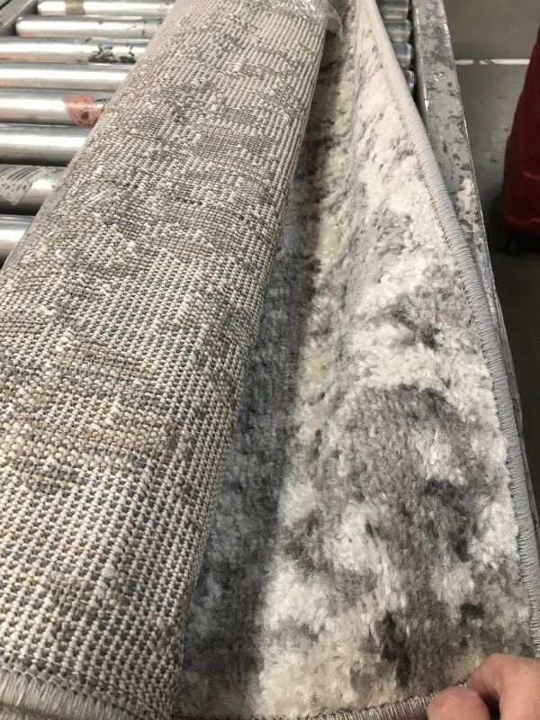 Photo 1 of 5ft x 8 gray rug 