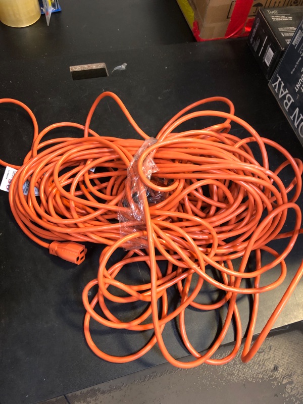 Photo 2 of 100 ft. 16/3 Light Duty Indoor/Outdoor Extension Cord, Orange
