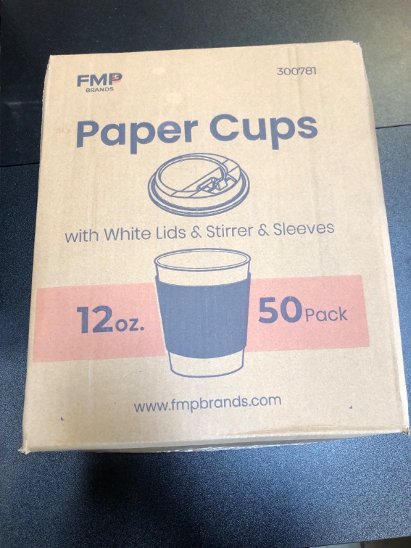 Photo 1 of 12oz Paper Cups With White Lids, Stirrers, and Sleeves 50 Count 