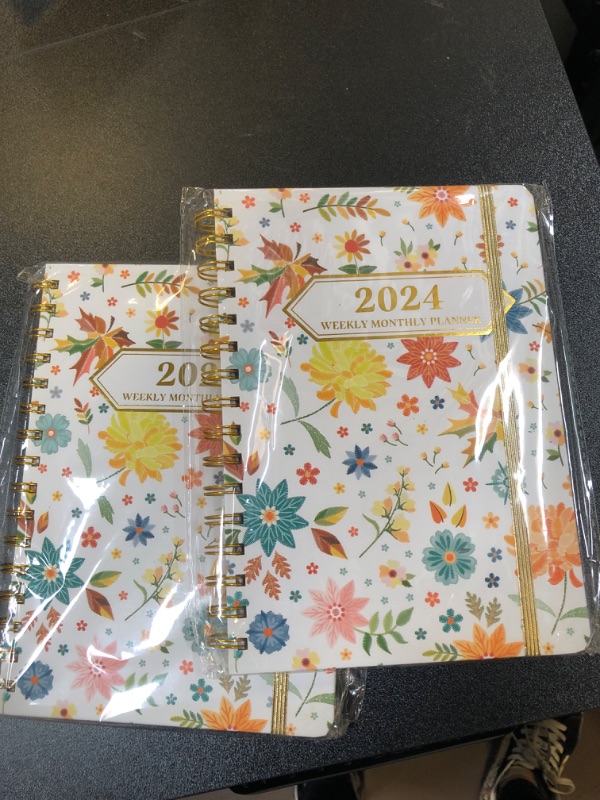 Photo 2 of  2 pack 
Ymumuda 2024 Planner, 12-Month Weekly Monthly Planner from JAN.2024 to DEC.2024, 8.4" X 6", Spiral Planner Notebook with Stickers, Elastic Closure, Inner Pocket, Sticky Index Tabs, Floral 05 8.4"×6" F2024-05