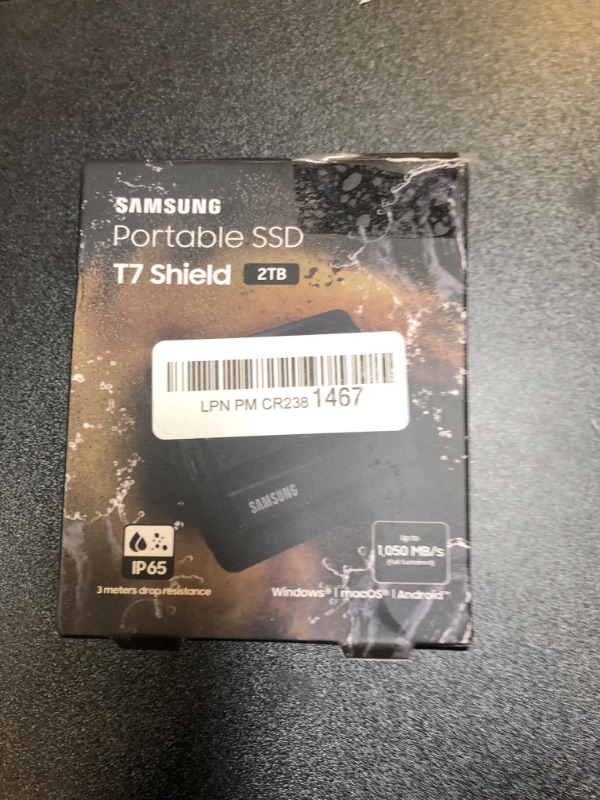 Photo 2 of SAMSUNG T7 Shield 2TB, Portable SSD, up-to 1050MB/s, USB 3.2 Gen2, Rugged, IP65 Water & Dust Resistant, for Photographers, Content Creators and Gaming, Extenal Solid State Drive (MU-PE2T0S/AM), Black Black 2 TB