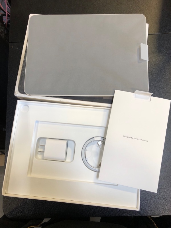 Photo 1 of Apple iPad Air (5th Generation): with M1 chip, 10.9-inch Liquid Retina Display, 64GB, Wi-Fi 6, 12MP front/12MP Back Camera, Touch ID, All-Day Battery Life – Starlight WiFi 64GB Starlight Without AppleCare+