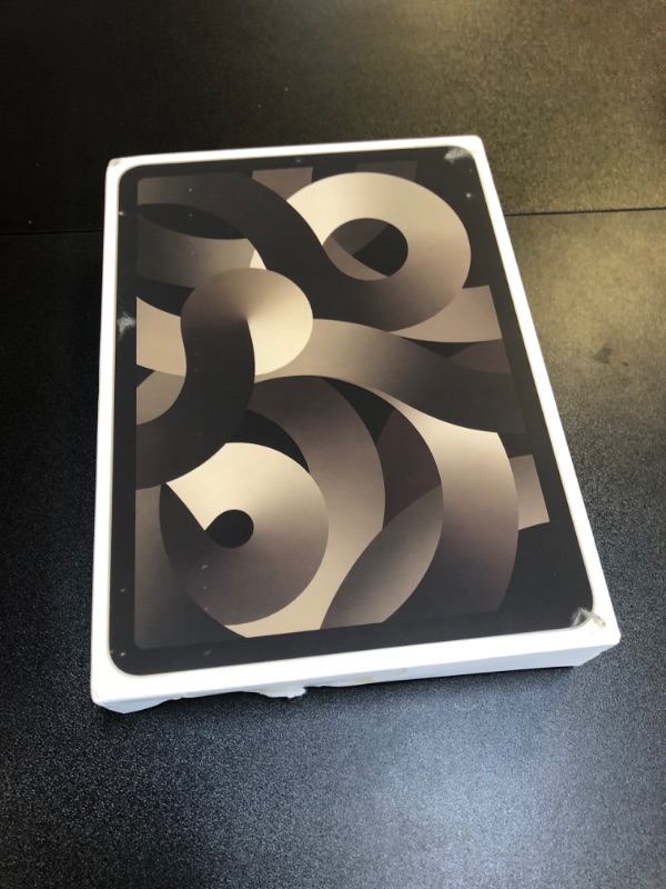 Photo 1 of Apple iPad Air (5th Generation): with M1 chip, 10.9-inch Liquid Retina Display, 64GB, Wi-Fi 6, 12MP front/12MP Back Camera, Touch ID, All-Day Battery Life – Starlight WiFi 64GB Starlight Without AppleCare+