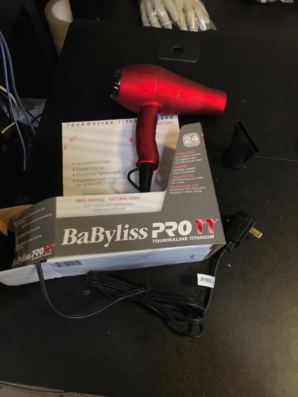 Photo 2 of Babyliss Pro TT Tourmaline Titanium Dryer Womens Babyliss Blow Dryer
(BLOW DRYER HAS STICKY RESIDUE)