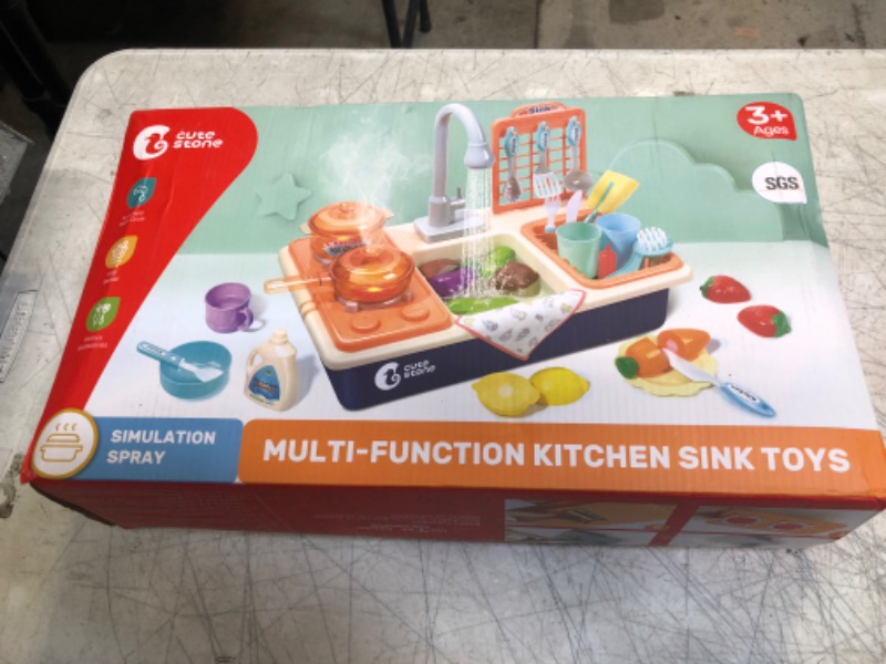 Photo 3 of CUTE STONE Pretend Play Kitchen Sink Toys with Play Cooking Stove, Pot and Pan with Spray Realistic Light and Sound, Dish Rack & Play Cutting Food, Utensils Tableware Accessories for Kids Toddlers

