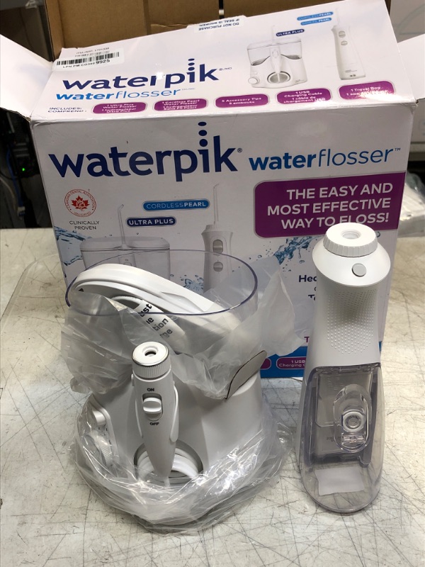 Photo 2 of ++SLIGHTLY DAMAGED BOX++ Waterpik Waterflosser Ultra Plus Water Flosser & Cordless Pearl Water Flosser - 5 Accessory tips, USB Charging Cable & Travel Case, 1 Pack