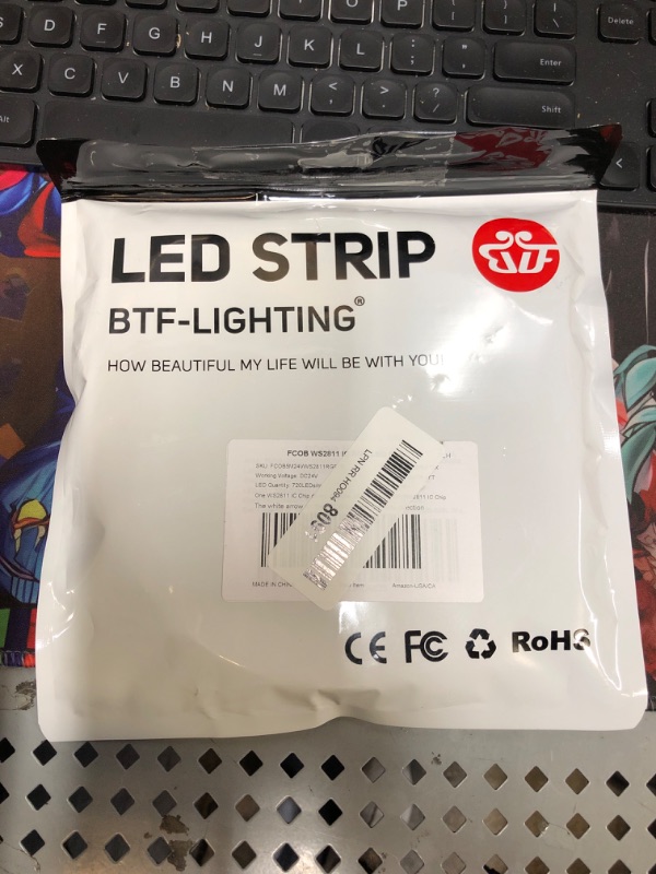 Photo 2 of BTF-LIGHTING FCOB WS2811 IC RGB Chip Flexible High Density Uniform Light Chasing Color LED Strip DC24V 720LED/m 16.4FT 100IC 12mm Width Dream Color LED Tape for Bedroom(NO Adapter or Controller) White PCB DC24V 16.4FT 720LED/m