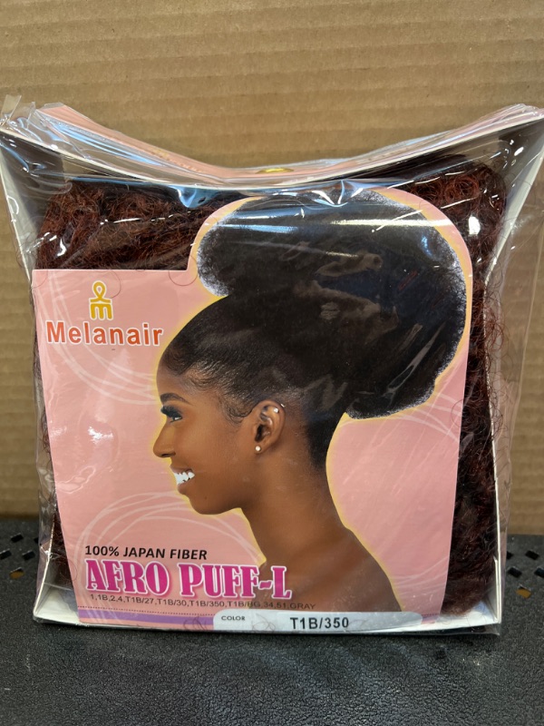 Photo 1 of CECINILL Afro Puff kinky curly Drawstring Ponytail Extension for Black Women Synthetic Short Afro Kinkys Curly Afro Bun Extension Hairpieces Updo Hair Extensions with Two Clips(TBUG#)