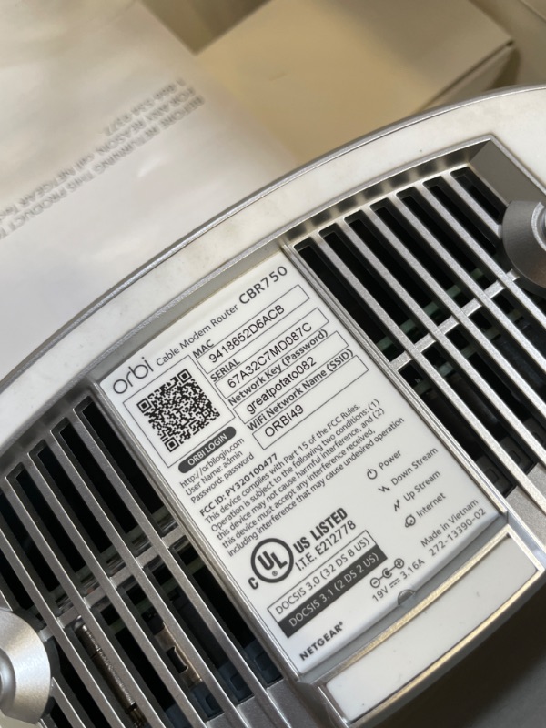 Photo 1 of NETGEAR Orbi WiFi 6 Cable Modem Router + Satellite Extender, AX4200, Covers 5000 sq. ft., 40+ Devices 2-Pack