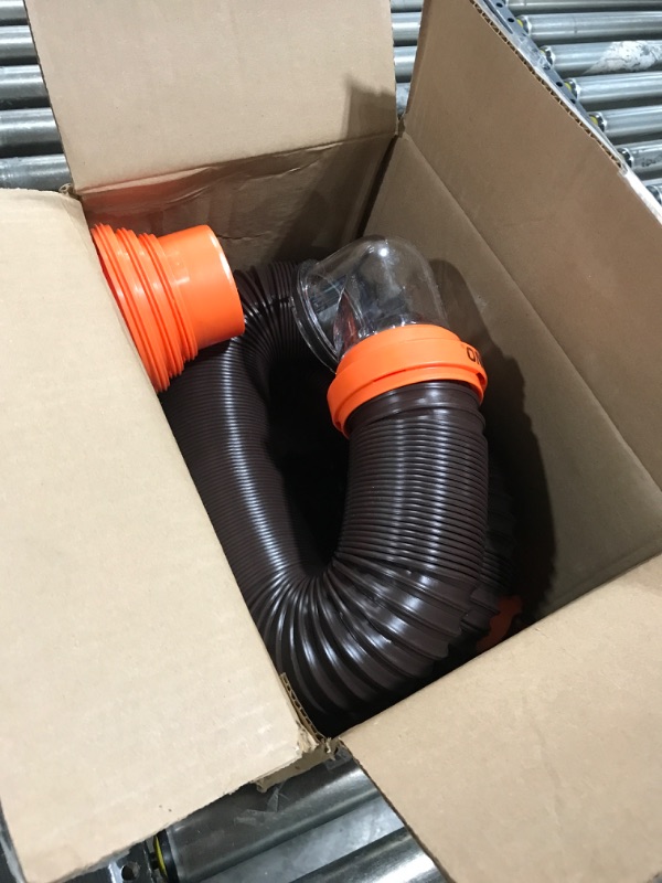 Photo 2 of Camco RhinoFLEX RV Sewer Hose Kit with Swivel Transparent Elbow and 4-in-1 Dump Station Fitting, Brown, 15 Feet (39770) 15ft Sewer Hose Kit Frustration-Free Packaging