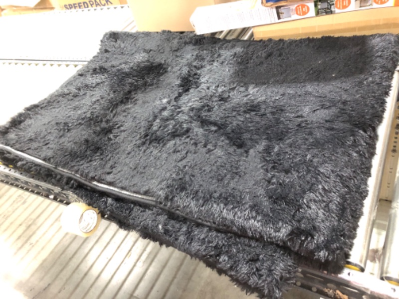 Photo 1 of 106" x  72" area rug --- color black 