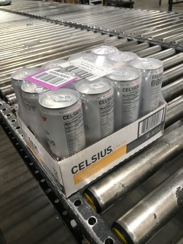 Photo 1 of  (Pack of 12) CELSIUS Peach Mango Green Tea, Functional Essential Energy Drink 12 Fl Oz // BEST BY 05/2025