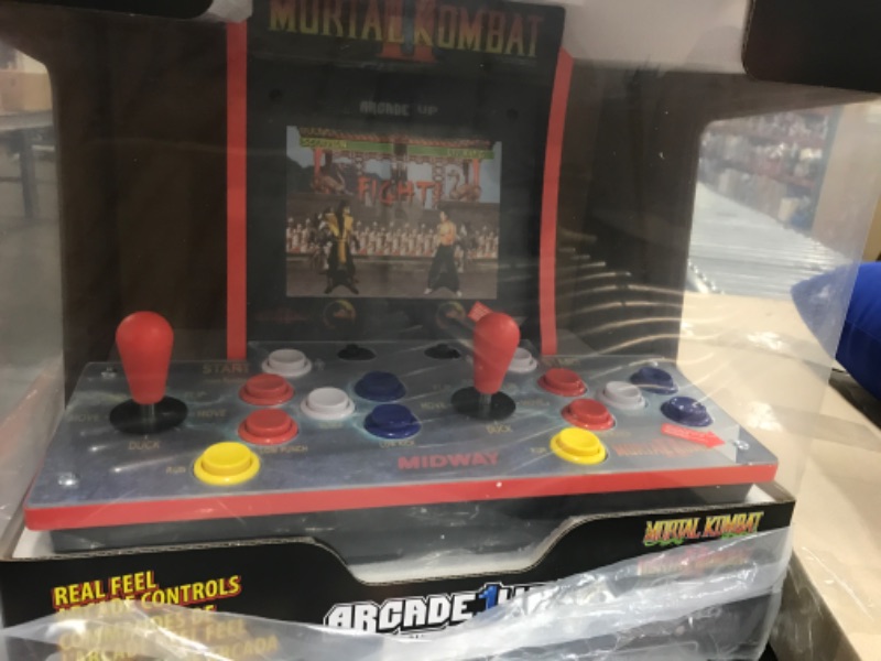 Photo 1 of Arcade 1Up Mortal Kombat 2 Player Countercade - Electronic Games;
**FACTORY SEALED,HAD TO OPEN TO TEST.**