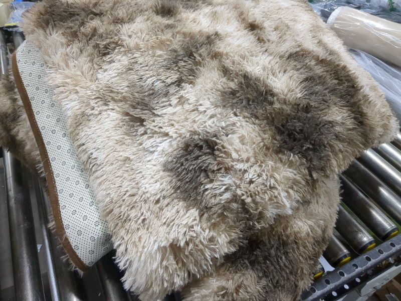 Photo 1 of BROWN FUR AREA RUG, UNKNOWN SIZE