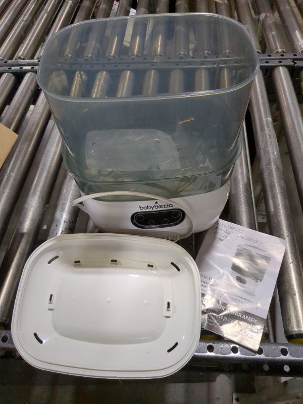 Photo 1 of Baby Brezza Baby Bottle Sterilizer and Dryer Advanced – Electric Steam Sterilization Machine – Universal Sterilizing for All Bottles: Plastic + Glass + Pacifiers + Breast Pump Parts - HEPA Filtration