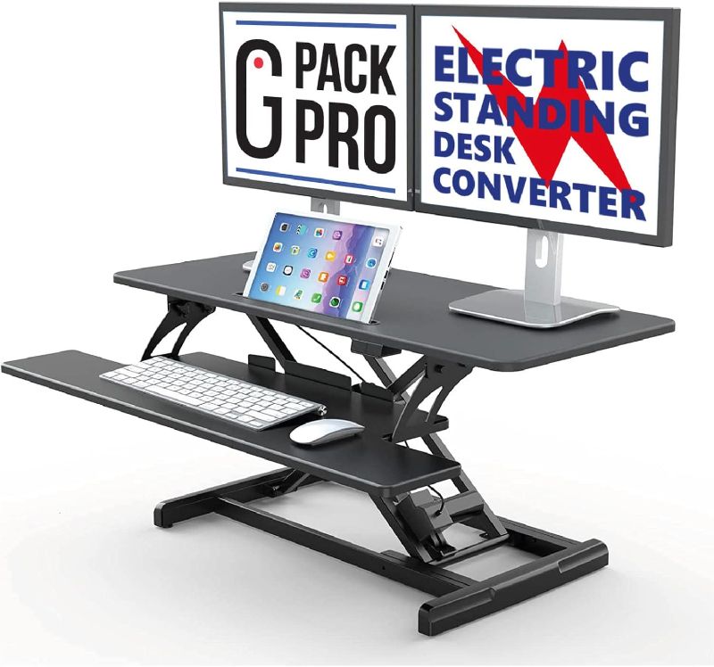 Photo 1 of G Pack Pro Standing Desk Converter - Electric Height Adjustable Desk for Sit Stand Desk Workstation with Removable Keyword Tray and Space for Dual Monitors - Ergonomic Design for Maximum Productivity
