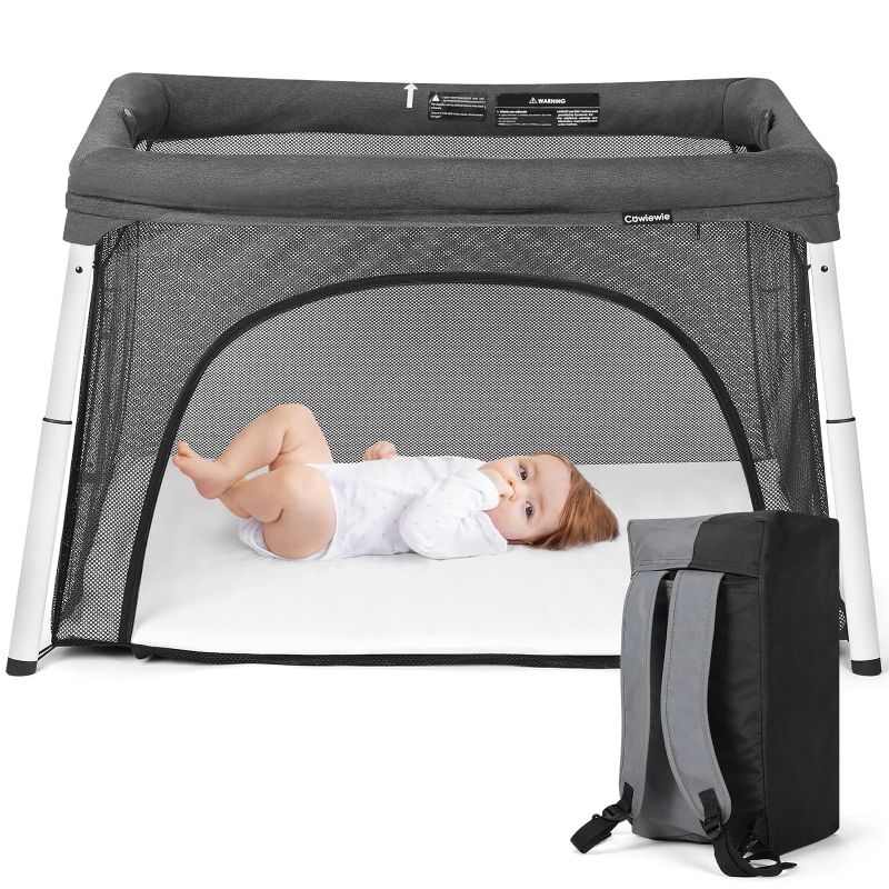 Photo 1 of Cowiewie Travel Crib and Playard, Folding Portable Crib for Baby and Toddlers 1-3, Breathable and Washable Baby Playpen with Waterproof Mattress, Compact Travel Crib Backpack - Dark Gray
