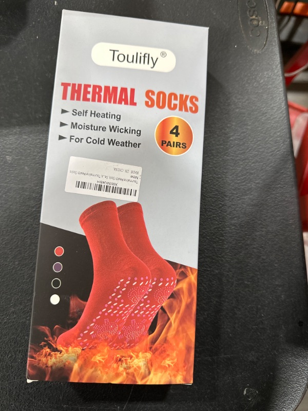 Photo 1 of 4 PAIR THERMAL SOCKS. 