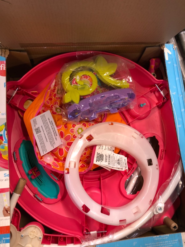 Photo 2 of Fisher-Price Jumperoo Baby Bouncer and Activity Center with Spinning Seat plus Lights Music Sounds and Baby Toys, Pink Petals
