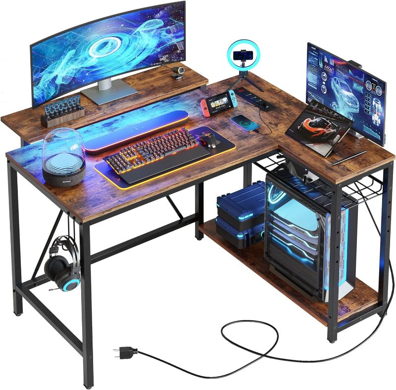 Photo 1 of Bestier Small L Shaped Desk with Charging Port & LED Strip,Modern Computer Desk with Reversible Storage Shelves,Corner Desk with Hooks for Bedroom Office Studio Workstation,Rustic Brown
