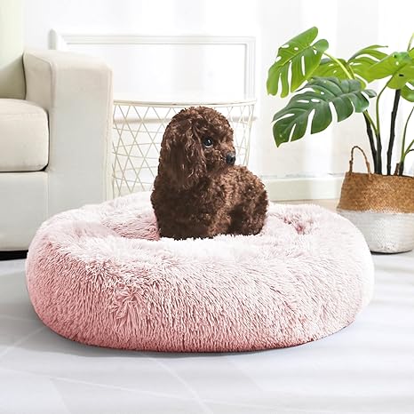 Photo 1 of  Calming Donut Dog Bed & Cat Bed, Anti-Anxiety Washable Dog Round Bed, Fluffy Faux Fur Plush Dog Cuddler Bed, Warming Cozy Soft Dog Cat Cushion Bed for Small Medium Dogs and Cats (24", Pink)