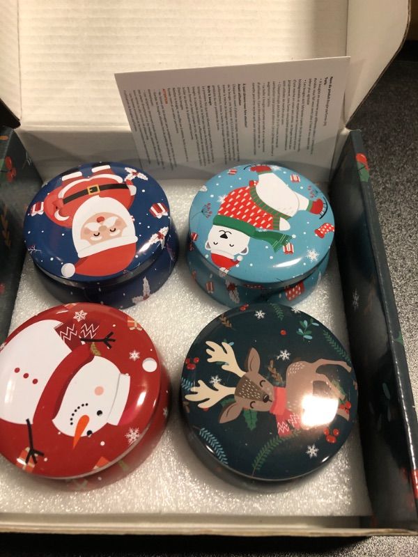 Photo 2 of  Round Christmas Cookie Tins of candles 4pack