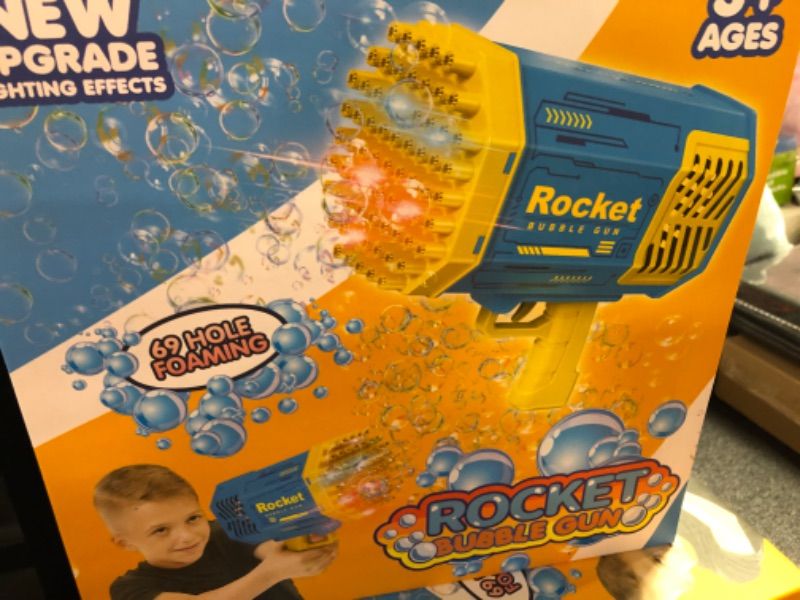 Photo 1 of AIBOIKE Bubble Gun?Bubble Machine Gun 69 Holes with Colorful Lights, Rocket Bubble Gun for Kids Adults, Bubble Makers Fun Gifts for Outdoor Indoor Birthday Wedding Party?Blue?