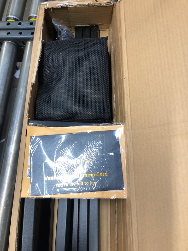 Photo 1 of Veehoo Metal Elevated Dog Bed, Cooling Raised Pet Cot with Chew Proof and Washable Textilene Mesh, No-Slip Feet and Stable Rustless Frame for Indoor & Outdoor, Medium, Black Medium-36.6"L x 22.8"W x 11"H Black