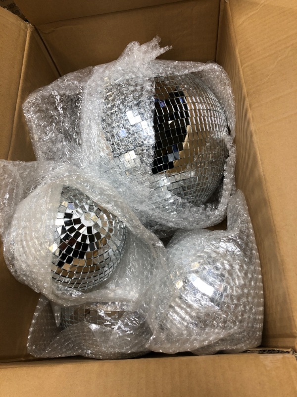 Photo 2 of 4 Pack Large Disco Ball Silver Hanging Disco Balls Reflective Mirror Ball Ornament for Party Holiday Wedding Dance and Music Festivals Decor Club Stage Props (12 Inch, 8 Inch, 6 Inch, 4 Inch)
