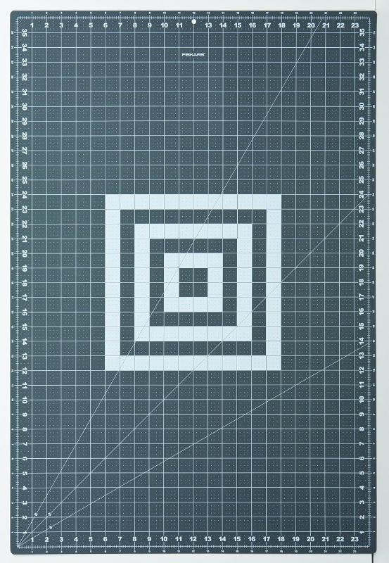 Photo 1 of Fiskars Self Healing Cutting Mat with Grid for Sewing, Quilting, and Crafts - 24" x 36” Grid - Gray
