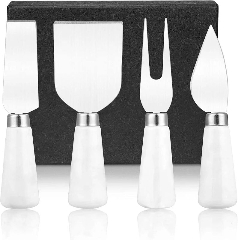 Photo 1 of 4PCs Stainless Steel Cheese Knife Spreader Set with Ceramic Handle, Cheese Shaver, Butter Spatula Knives, and Fork for Kitchen, Home. Best Gift for Friends, Thanksgiving, Birthday Party (White)
