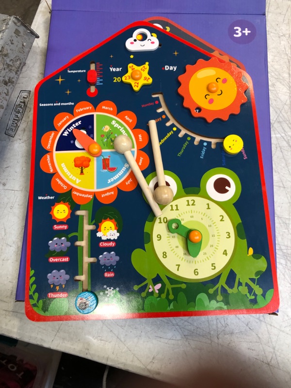 Photo 2 of Aomola Kids Calendar Clock for Learning - Toddler Montessori Wooden Toys - Includes Weather, Clock, Seasons Learning Busy Board, Early Education Toys for Boys Girls 3 4 5 6
